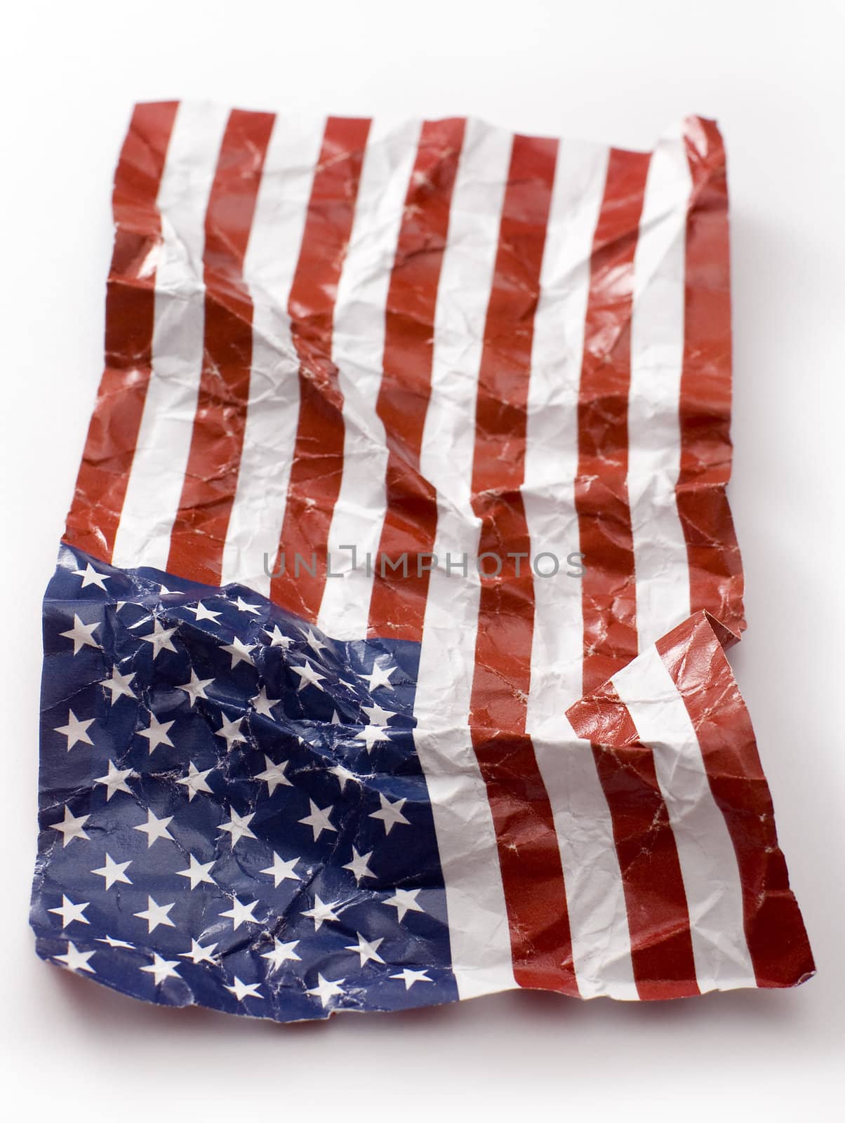 wrinkled USA paper flag isolated on white background, vertical photo