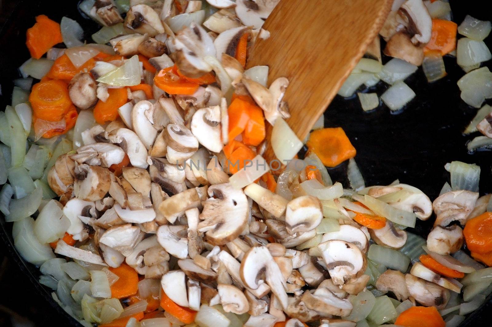 fried fungi on a frying pan,