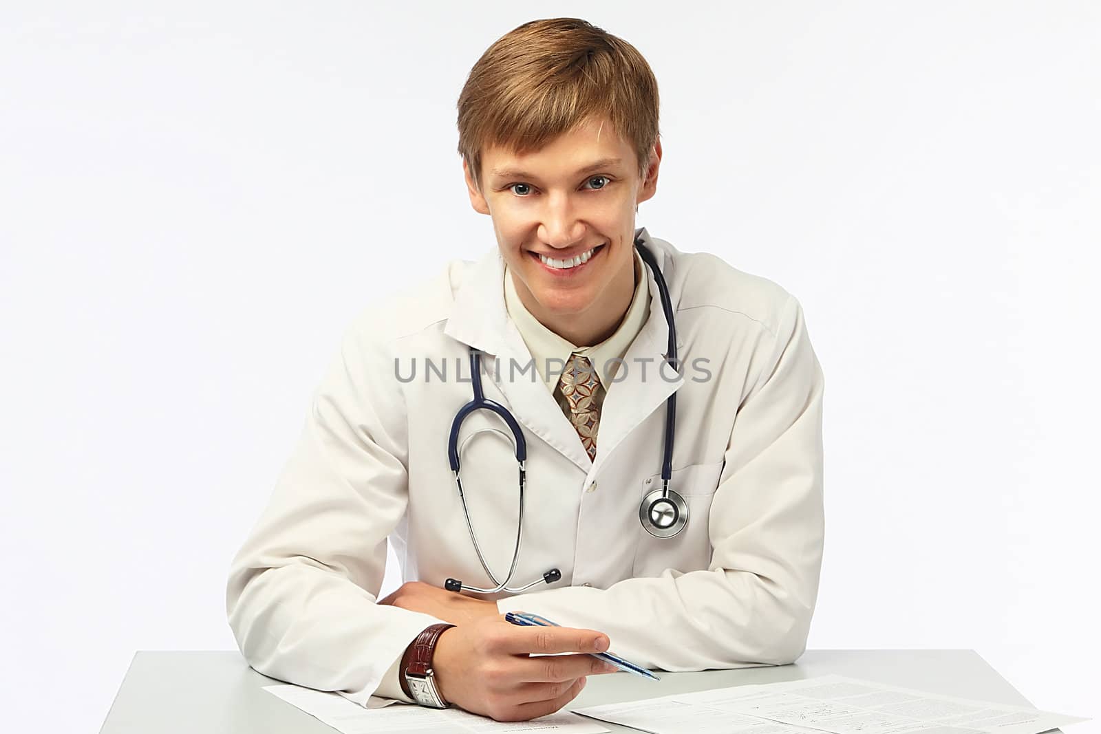 The young doctor in a white dressing gown