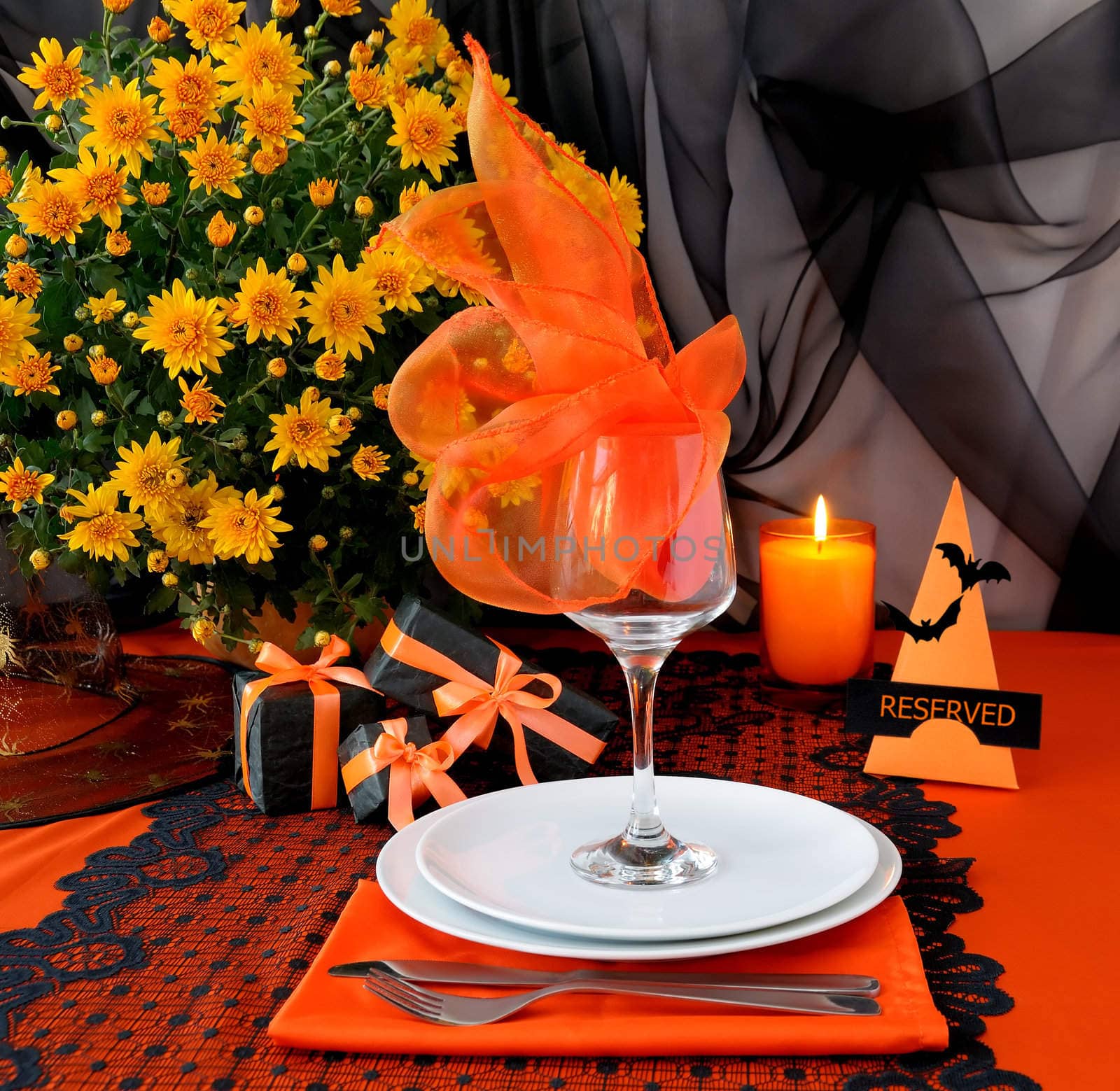 Festive table with gifts for Halloween by Apolonia