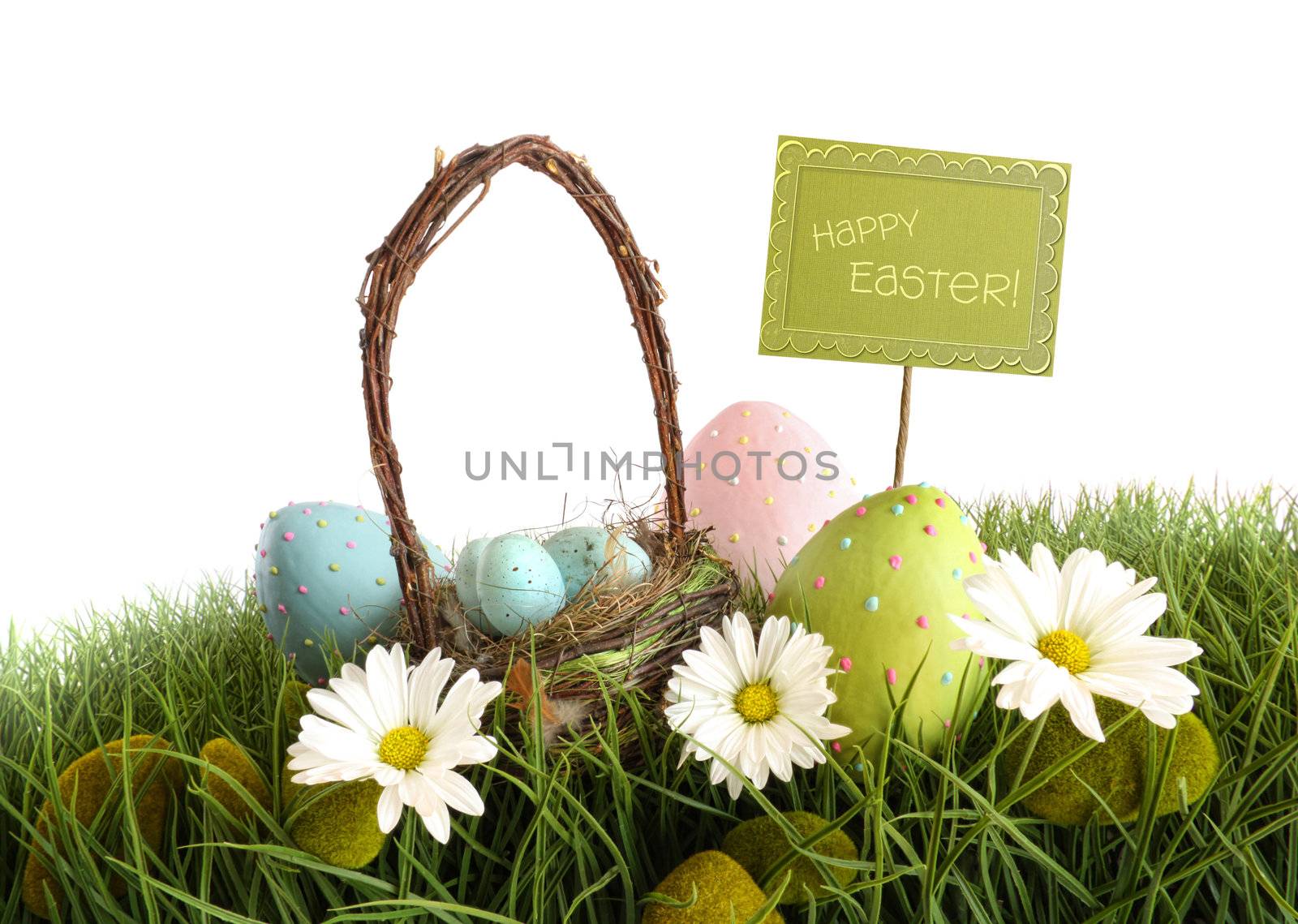 Easter eggs with  basket in the grass by Sandralise