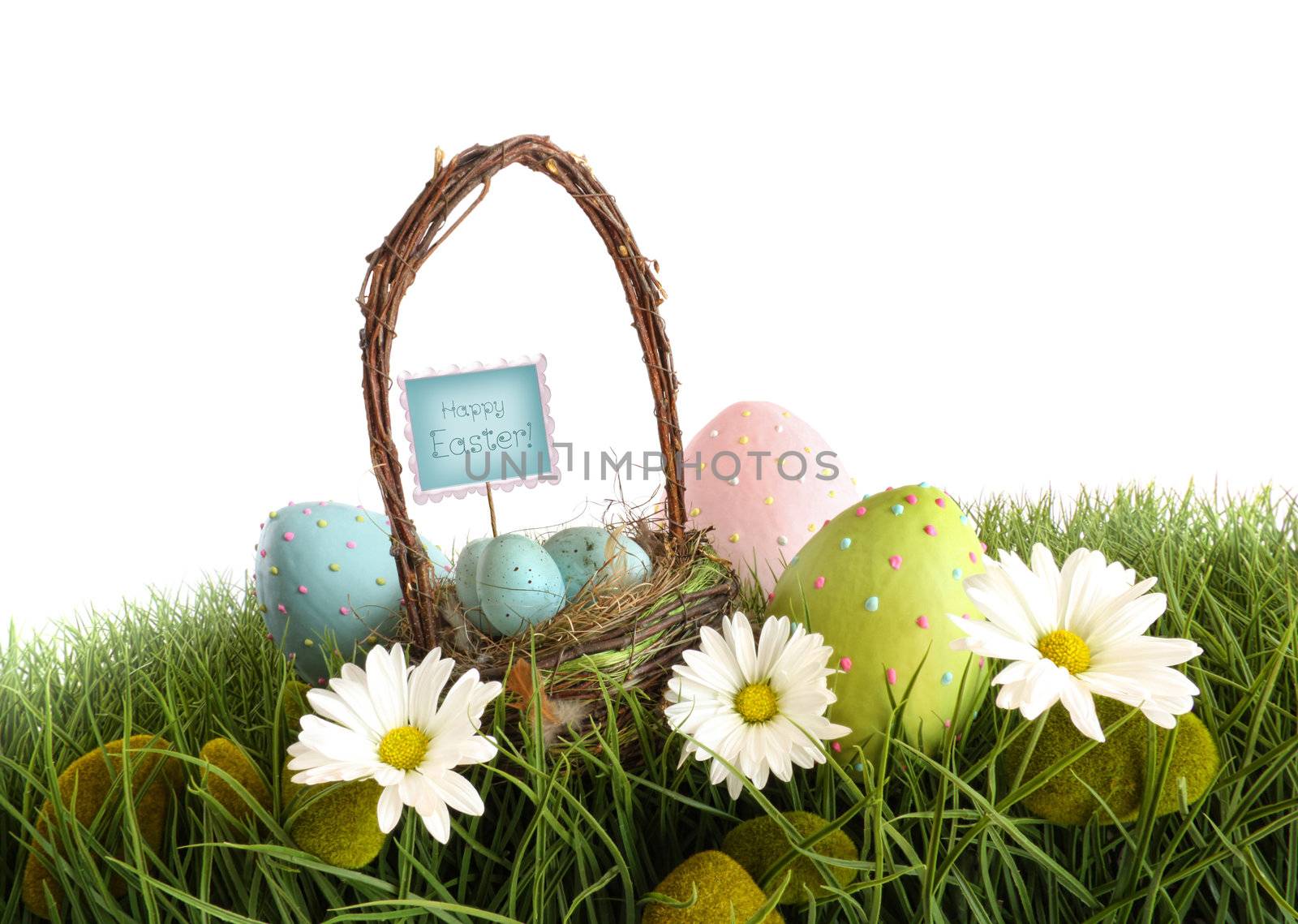 Easter eggs with  basket in the grass by Sandralise