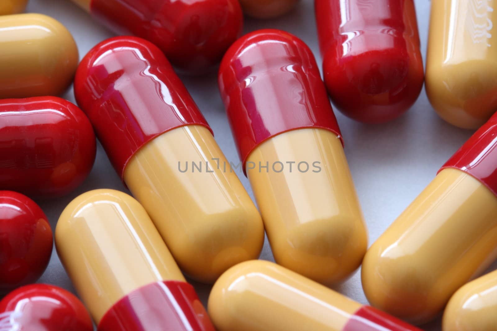 bunch of prescription drugs close up by njene