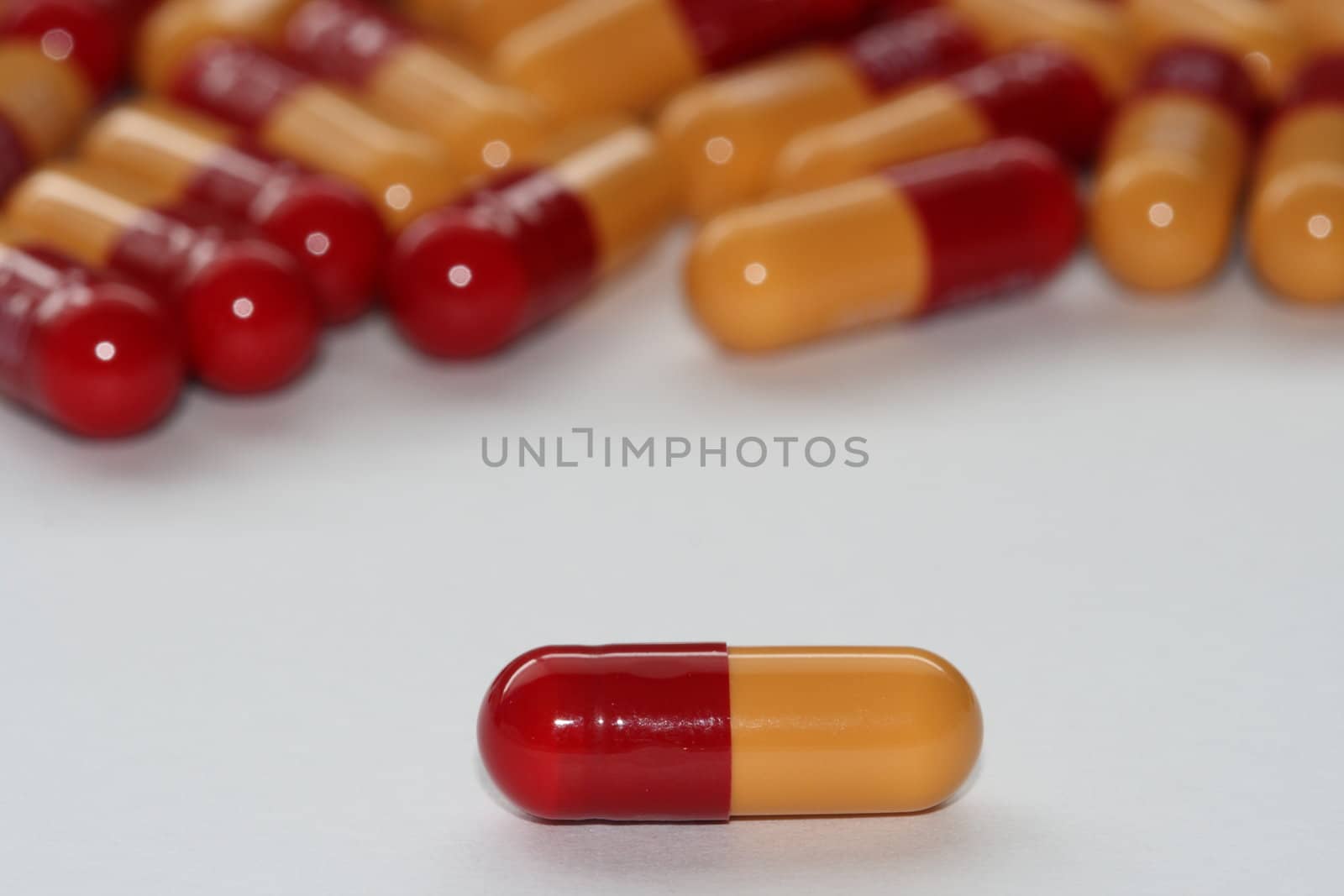 close up of single drug capsule by njene