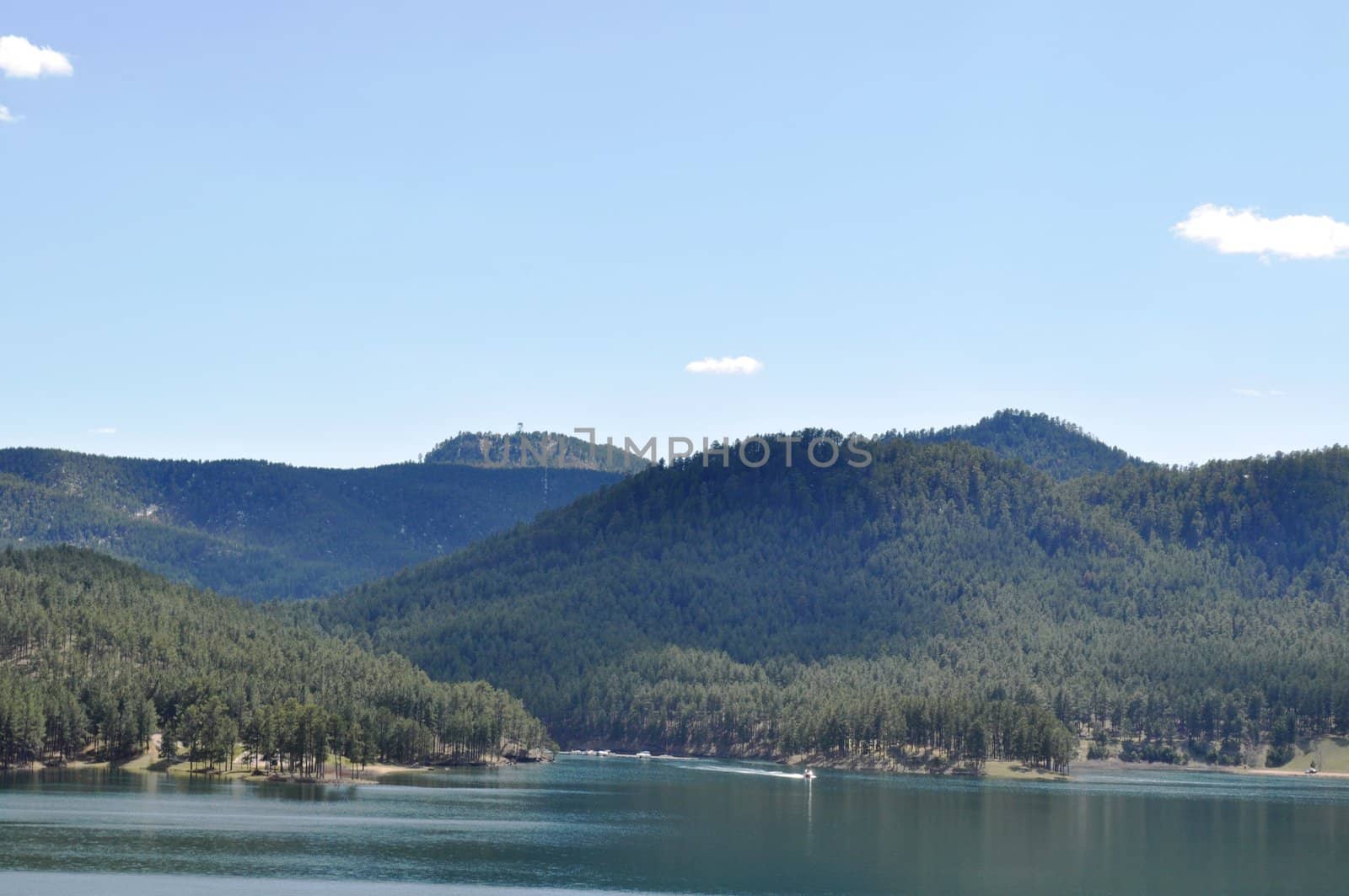 Black hills and water background