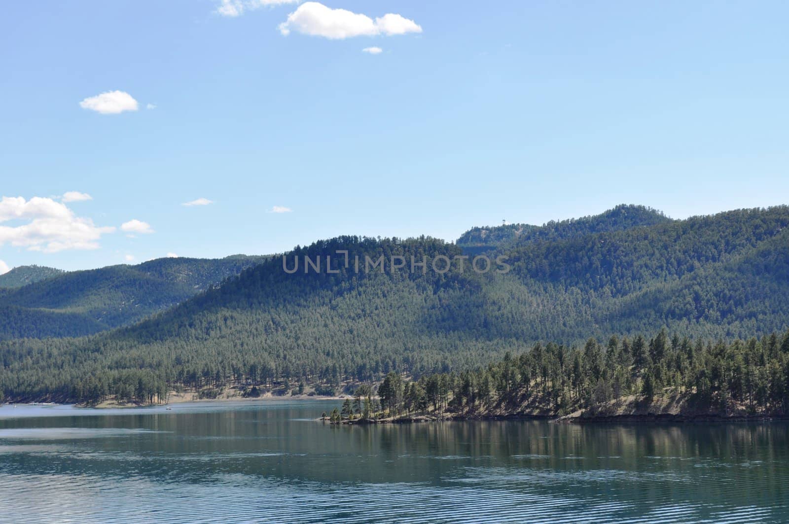 Black hills and water background by RefocusPhoto