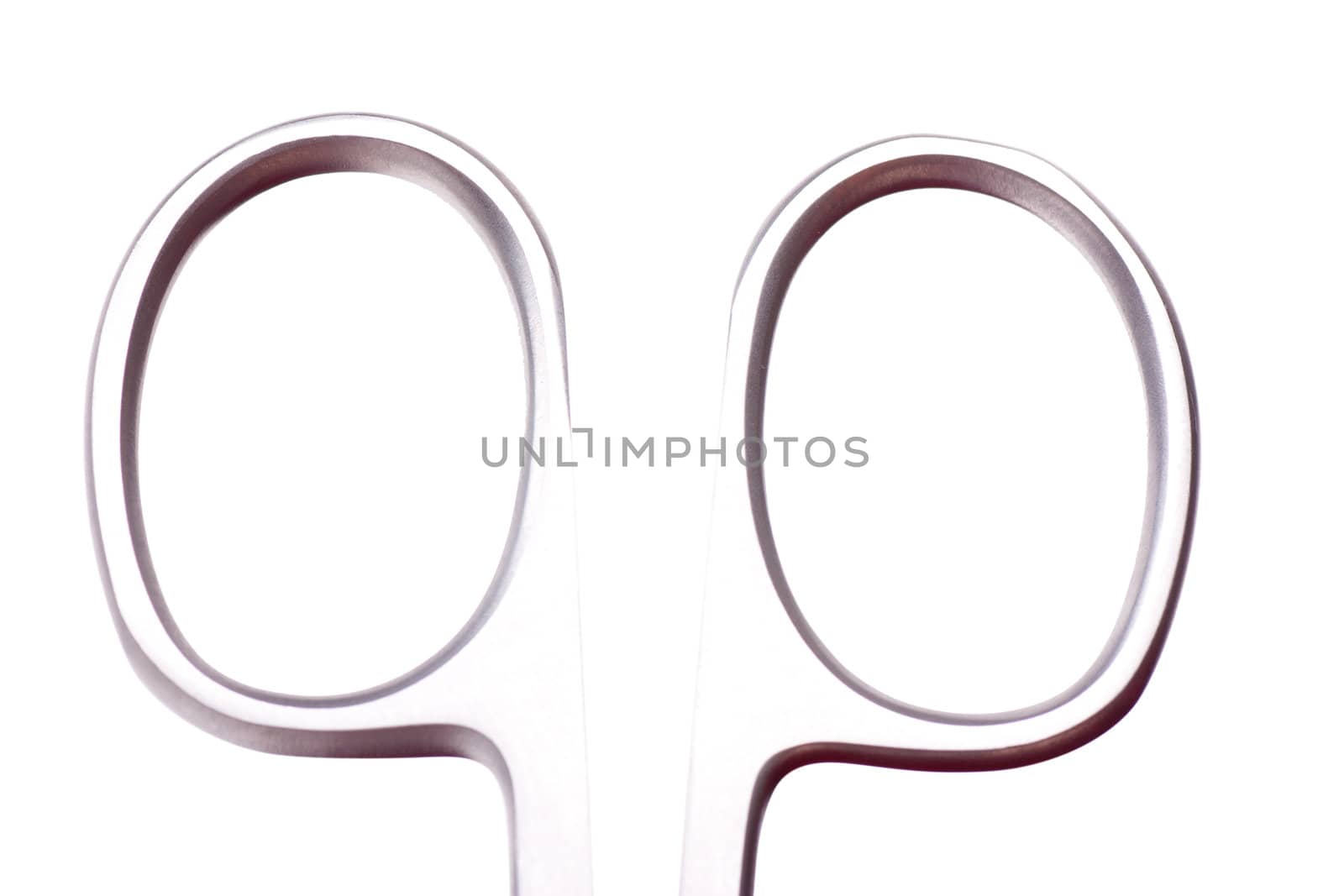 Macro view of handle of scissors isolated over white