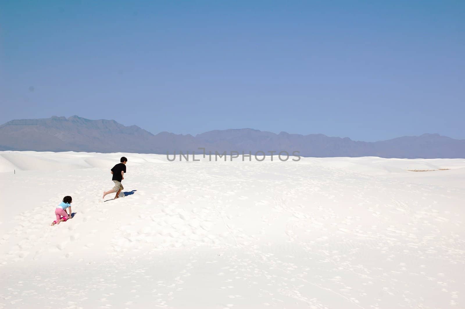 White Sands kids climbing by RefocusPhoto
