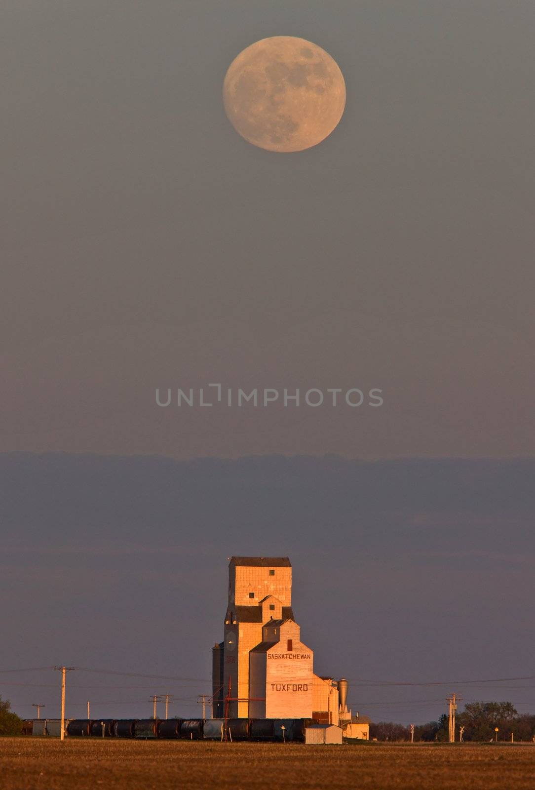 Grain Elevator and Full moon by pictureguy