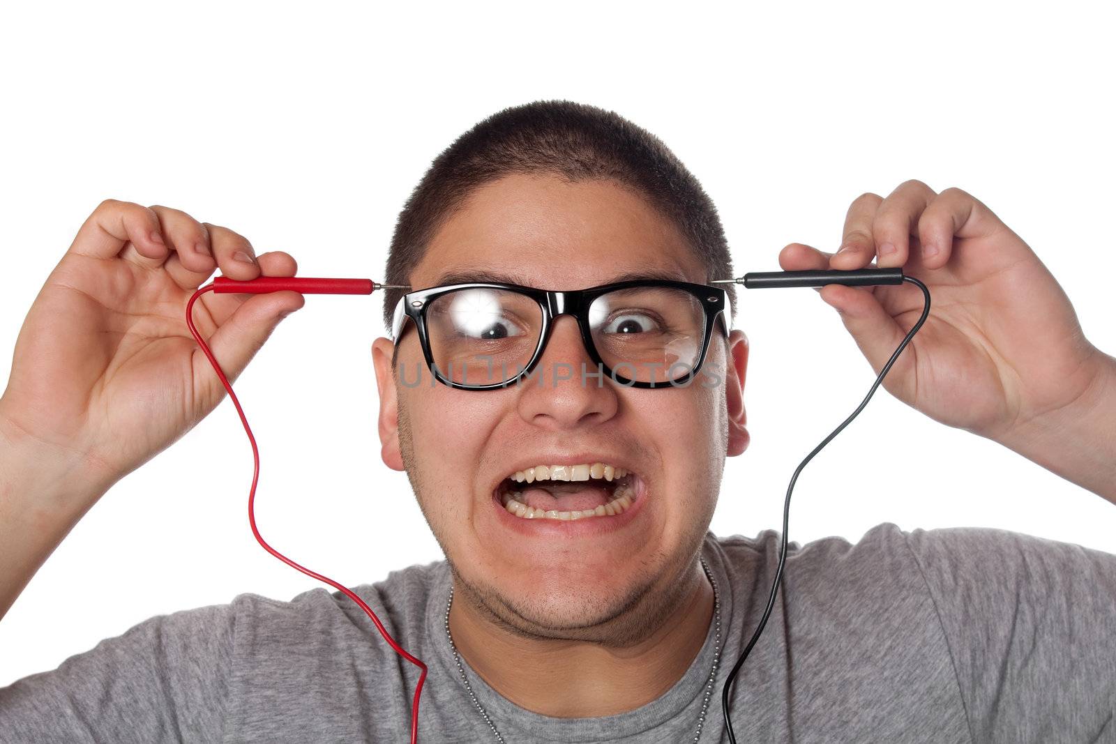 A goofy man wearing nerd glasses isolated over white with a funny expression on his face.