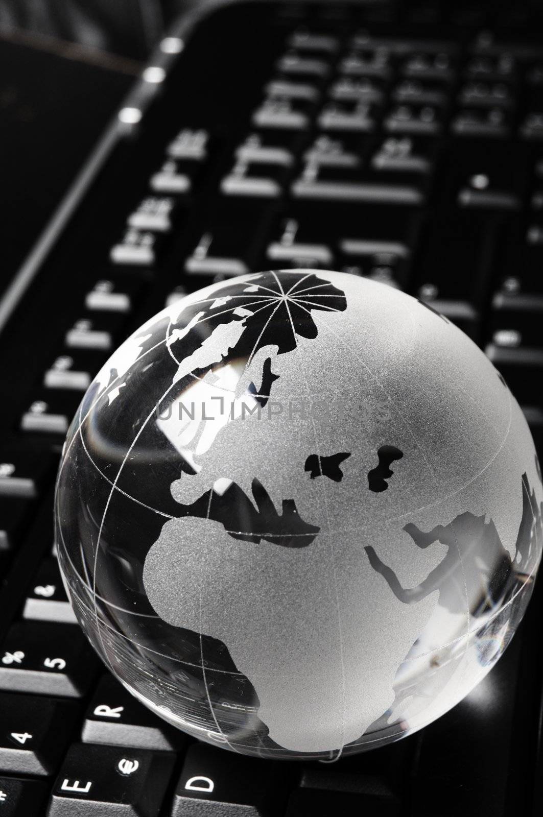 globe and keyboard showing global communication or internet concept