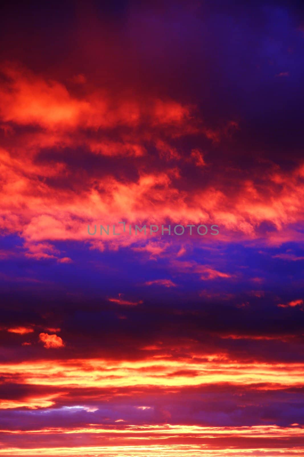 Storm Clouds At Sunset by yucas