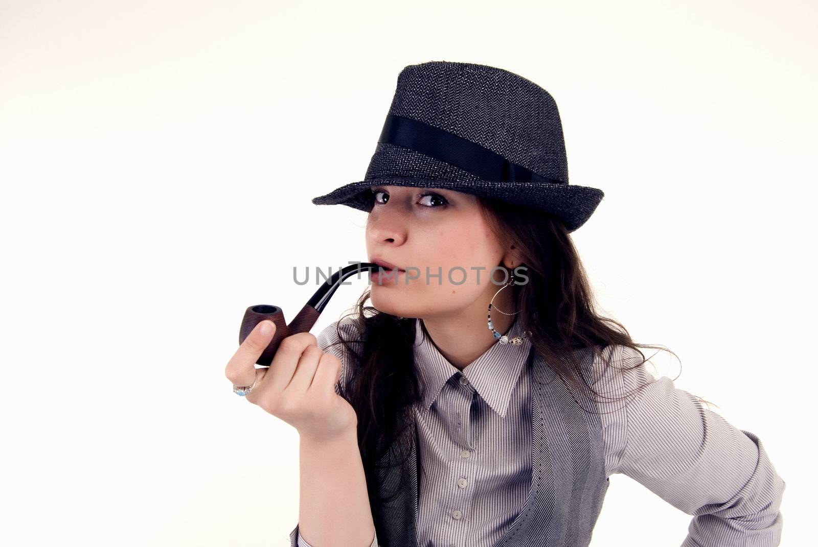  Young girl posing with pipe isolated on white 