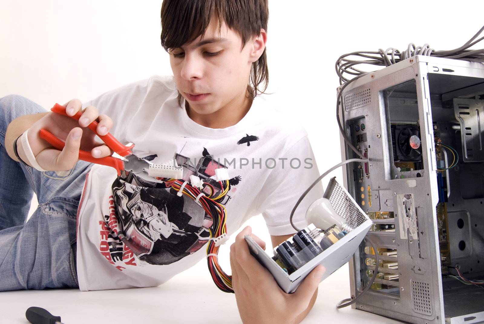  young man repairing his computer