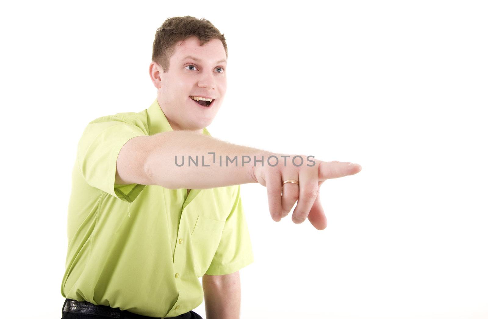 Handsome young man pointing away over white background 