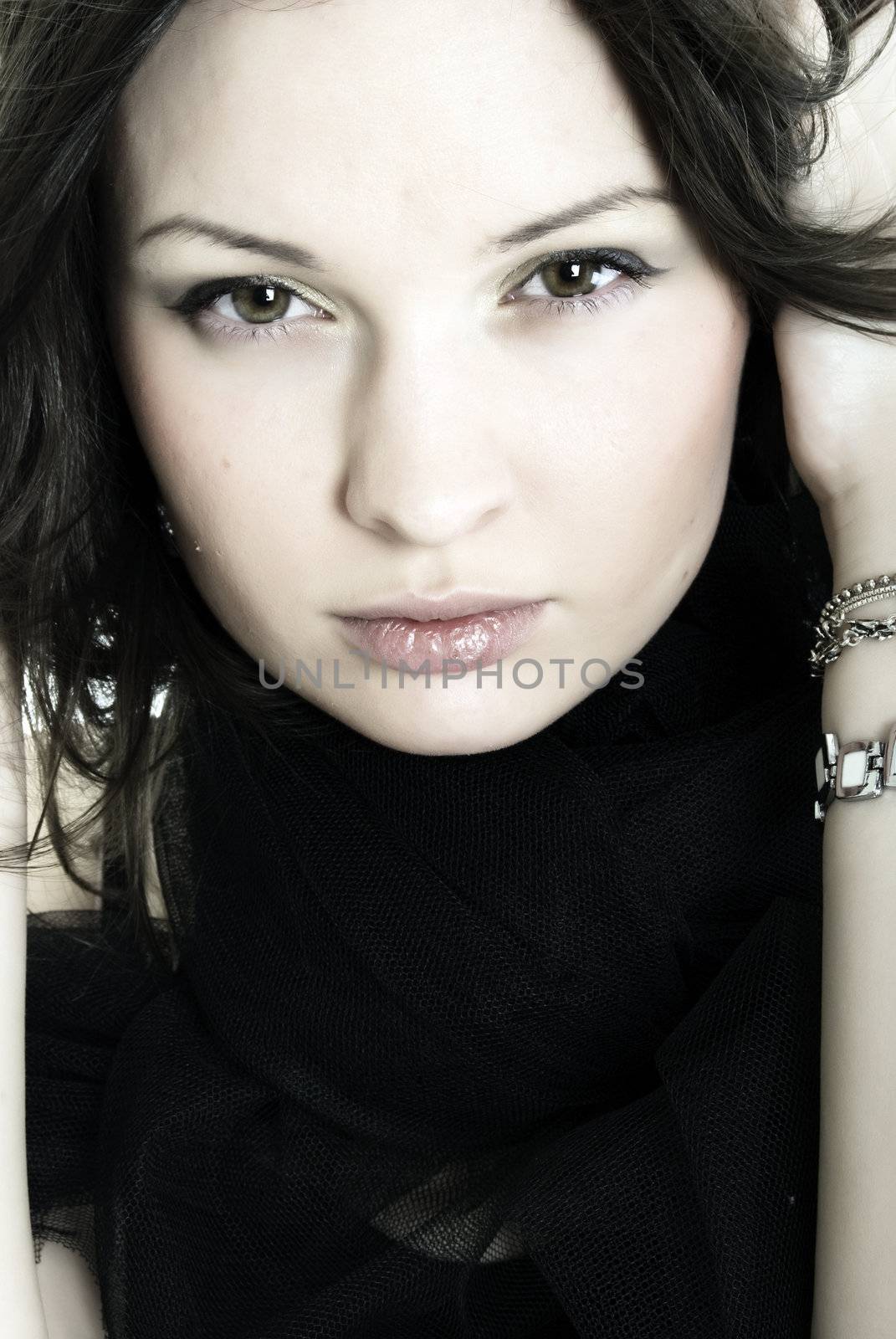 Portrait of a young beautiful brunette close-up