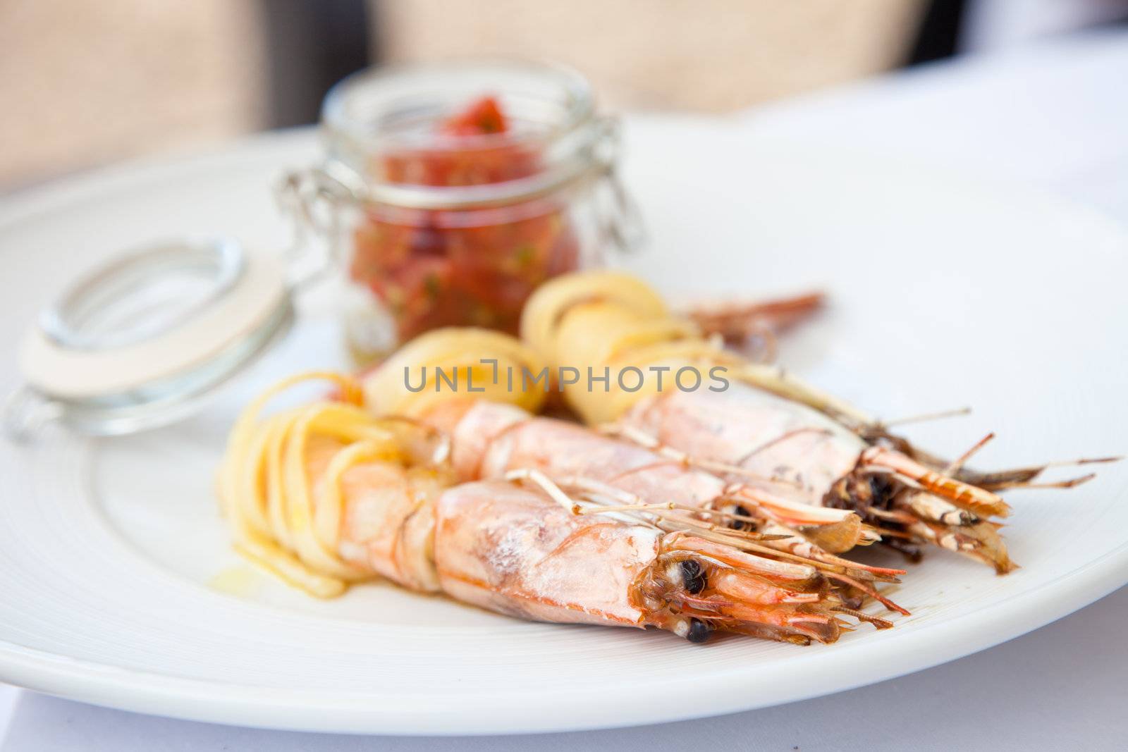 Delicious plate of prawns as an appetizer wrapped in pasta