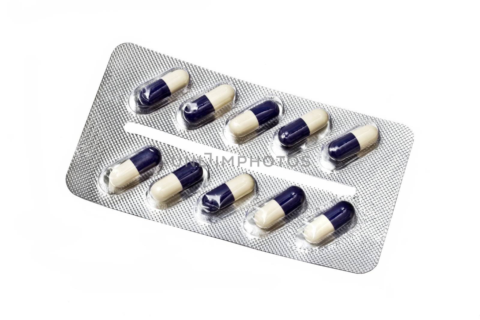 capsules packed in blister isolated on white 
