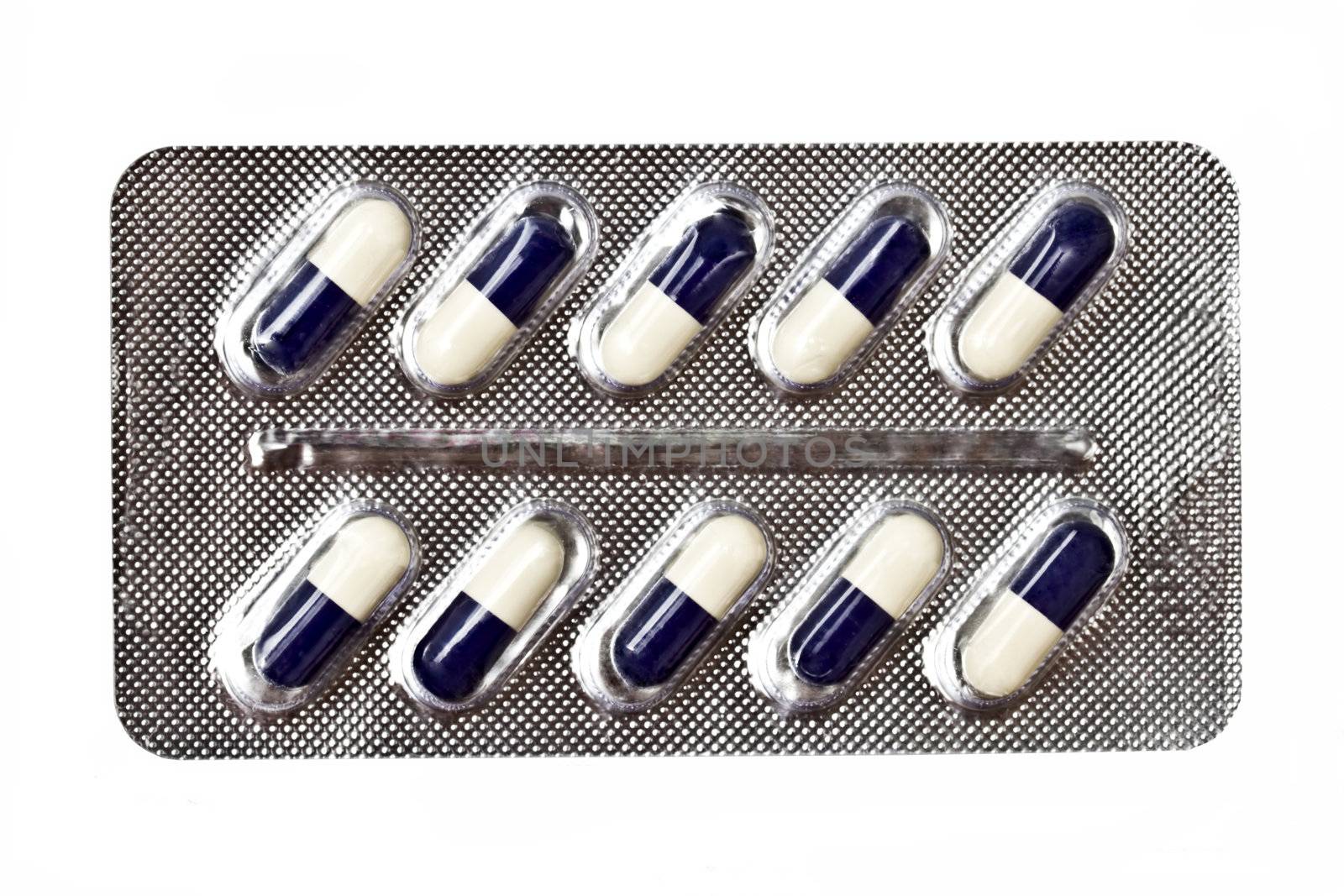 capsules packed in blister isolated on white 
