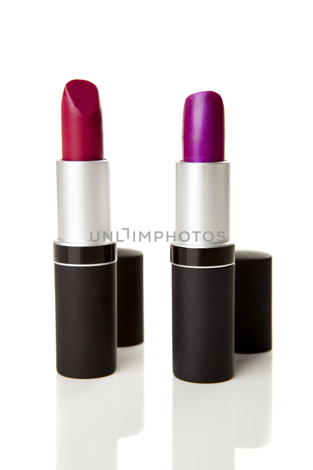 Pink and Red Lipstick isolated over a white background