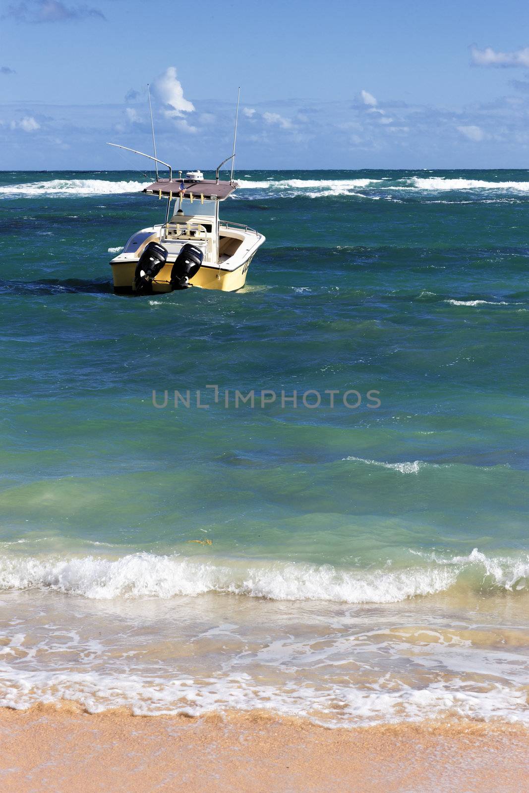 caribbean beach with boat on the sea in summer