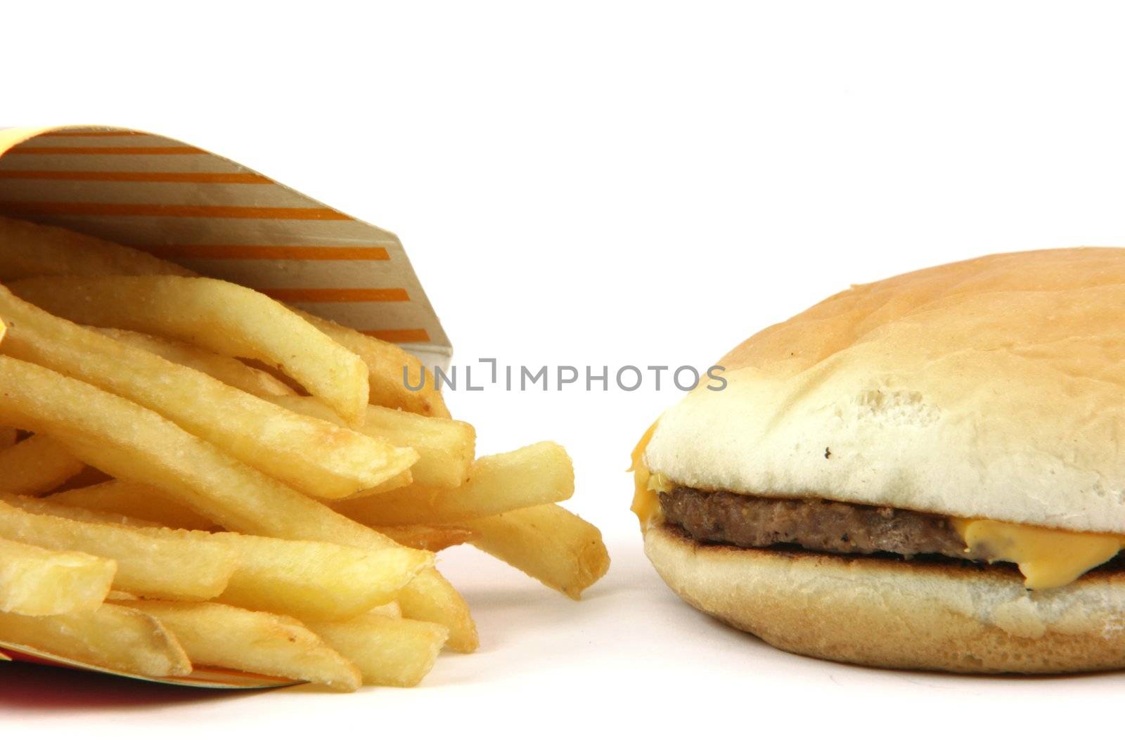 french fries and cheeseburger  detail on white backround food concepts