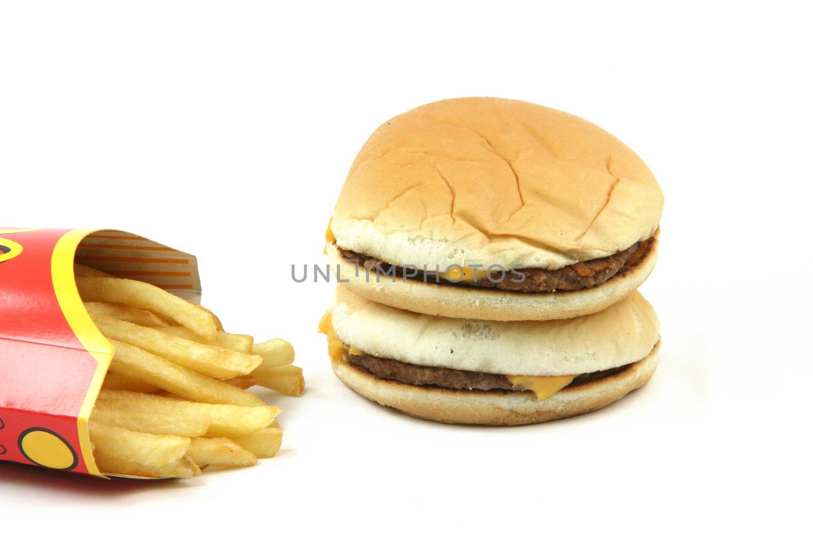 two cheeseburgers with french fries in box isolated on white backround food concepts