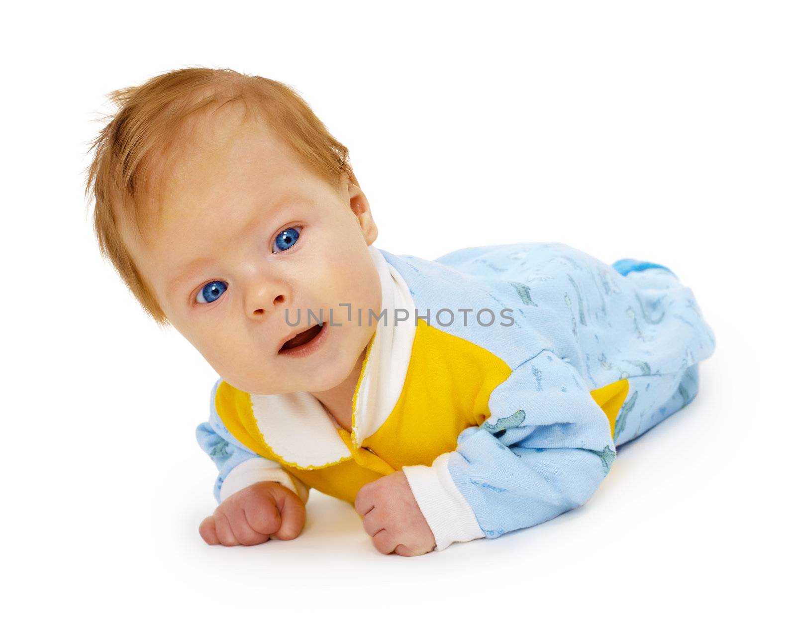 Baby lying on the floor isolated on white background