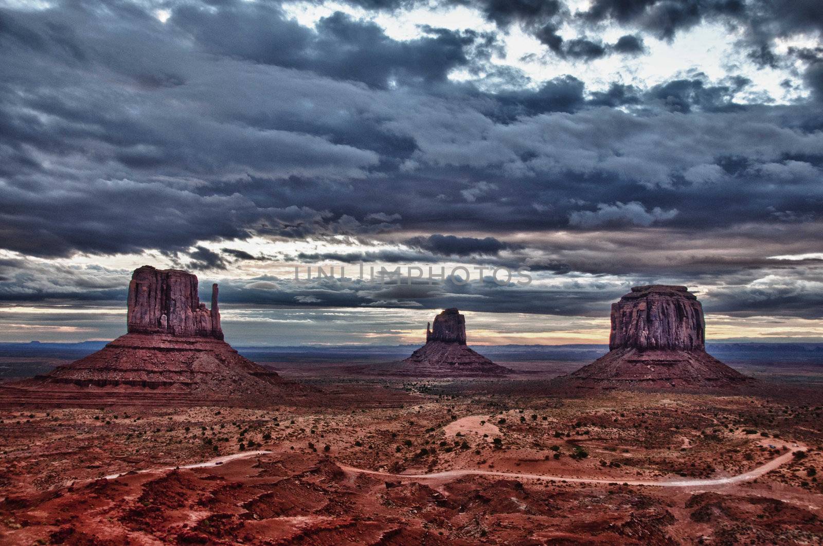 Monument valley cloudy dramatic sunrise by martinm303