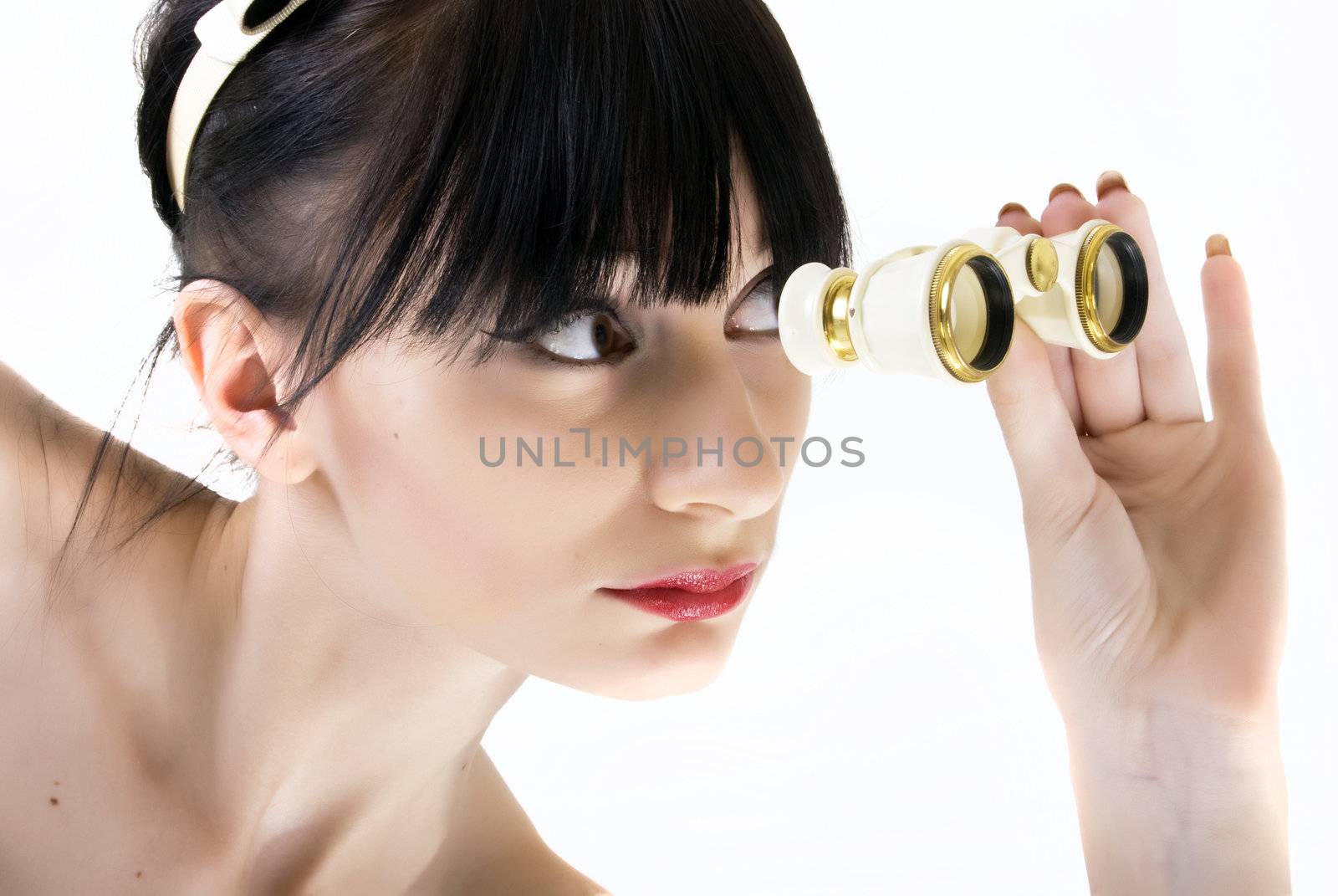 young attractive girl with binoculars isolated on white