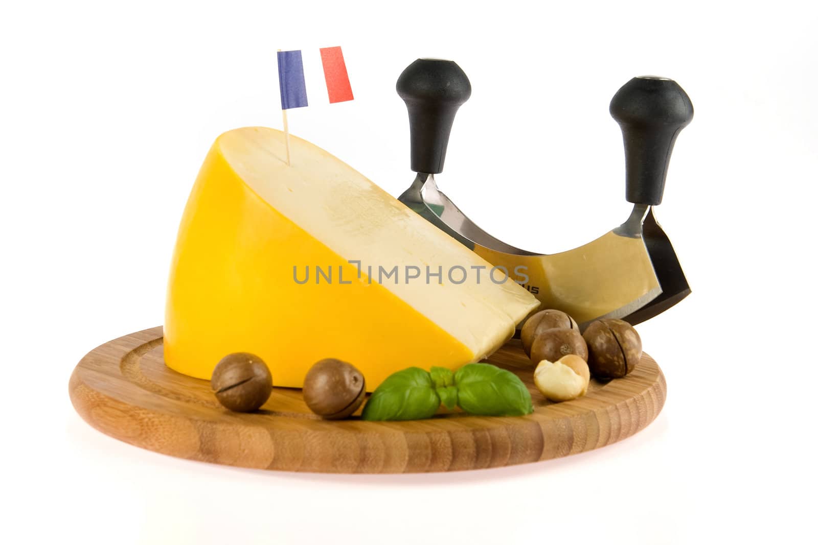 a kilogramm cheese, a chees slicer and nuts