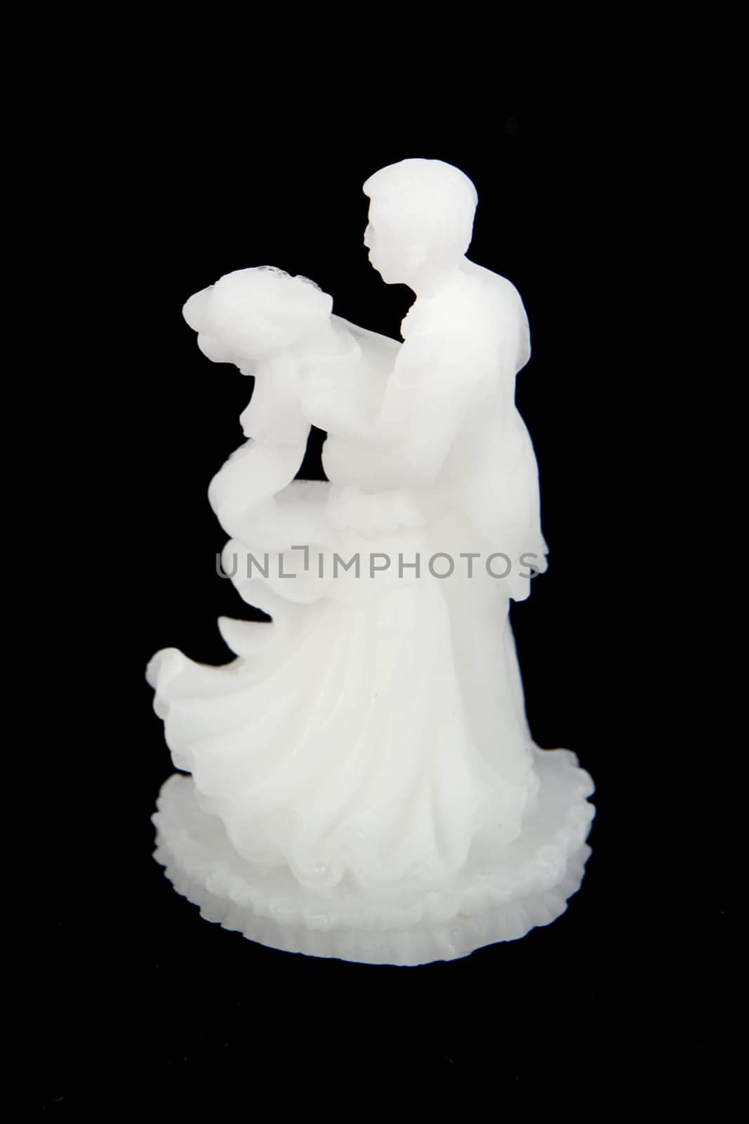 a white bride and groom on black