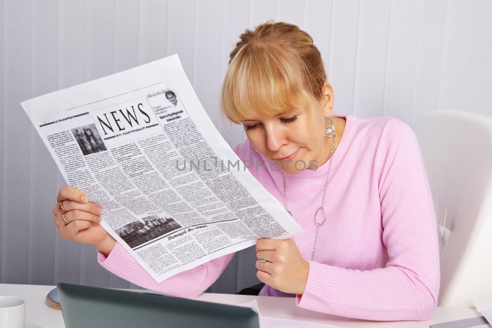 Woman reading newspaper - bad news by pzaxe