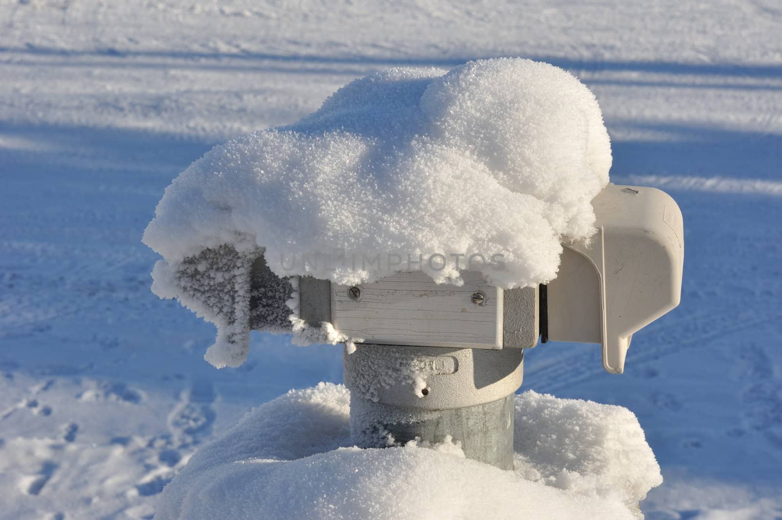 Snow Encrusted Electrical Outlet