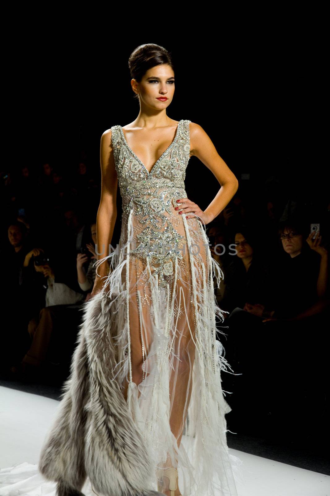 NEW YORK, NY - FEBRUARY 11: A model walks the runway at the Farah Angsana Fall 2011 fashion show during Mercedes-Benz Fashion Week at The Studio at Lincoln Center on February 11, 2011 in New York City. (Photo by Diana Beato)