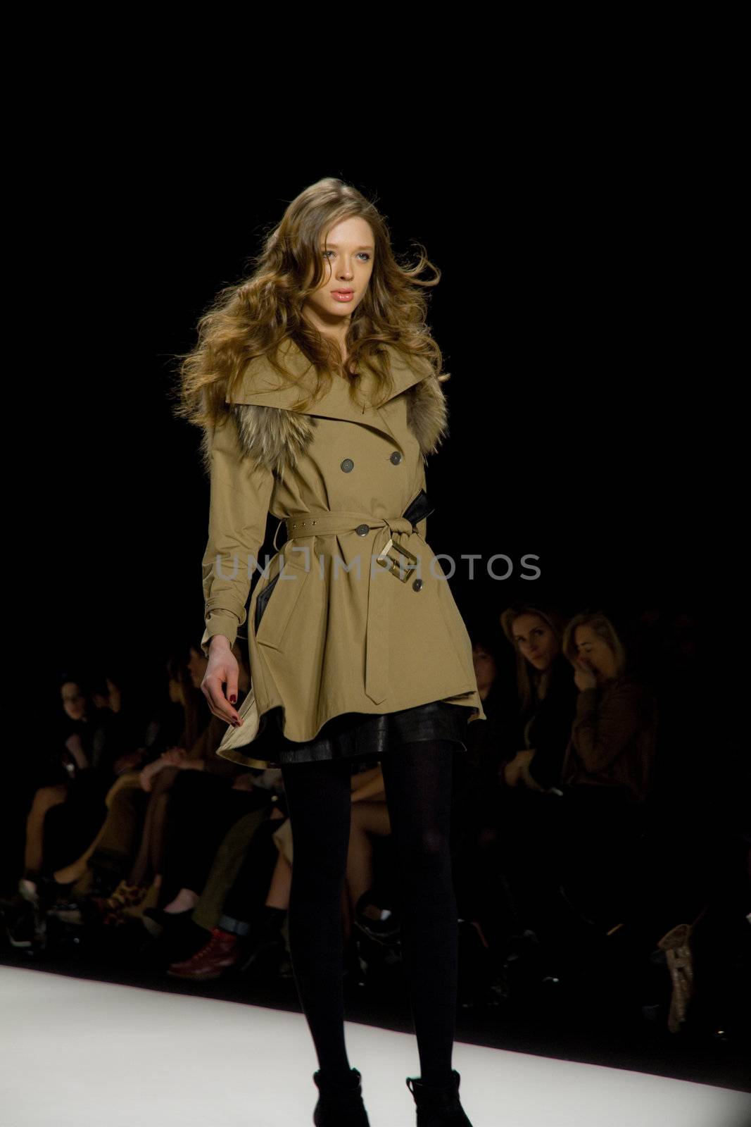 NEW YORK, NY - FEBRUARY 11: A model walks the runway at the Rebecca Minkoff Fall 2011 fashion show during Mercedes-Benz Fashion week at The Theatre at Lincoln Center on February 11, 2011 in New York City. (Photo by Diana Beato)