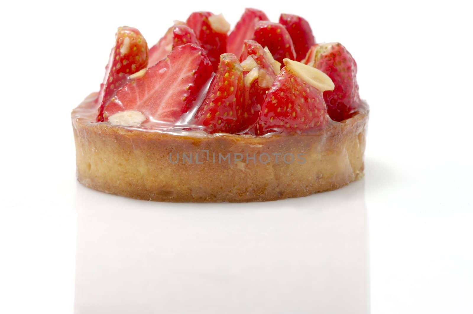 Strawberry and Almond Tart. Shot on white