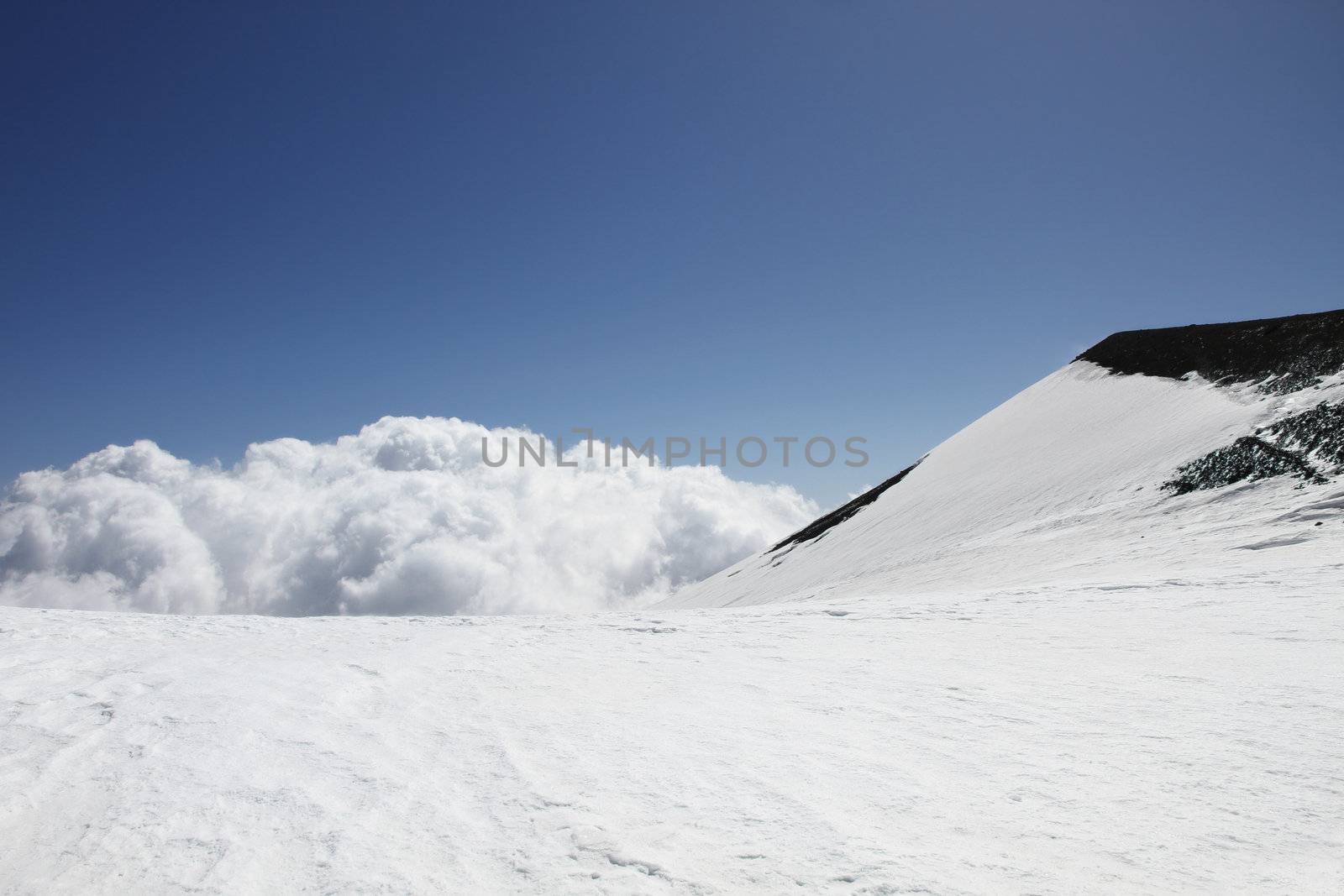 clouds on volcano mount Etna in Sicily, Italy