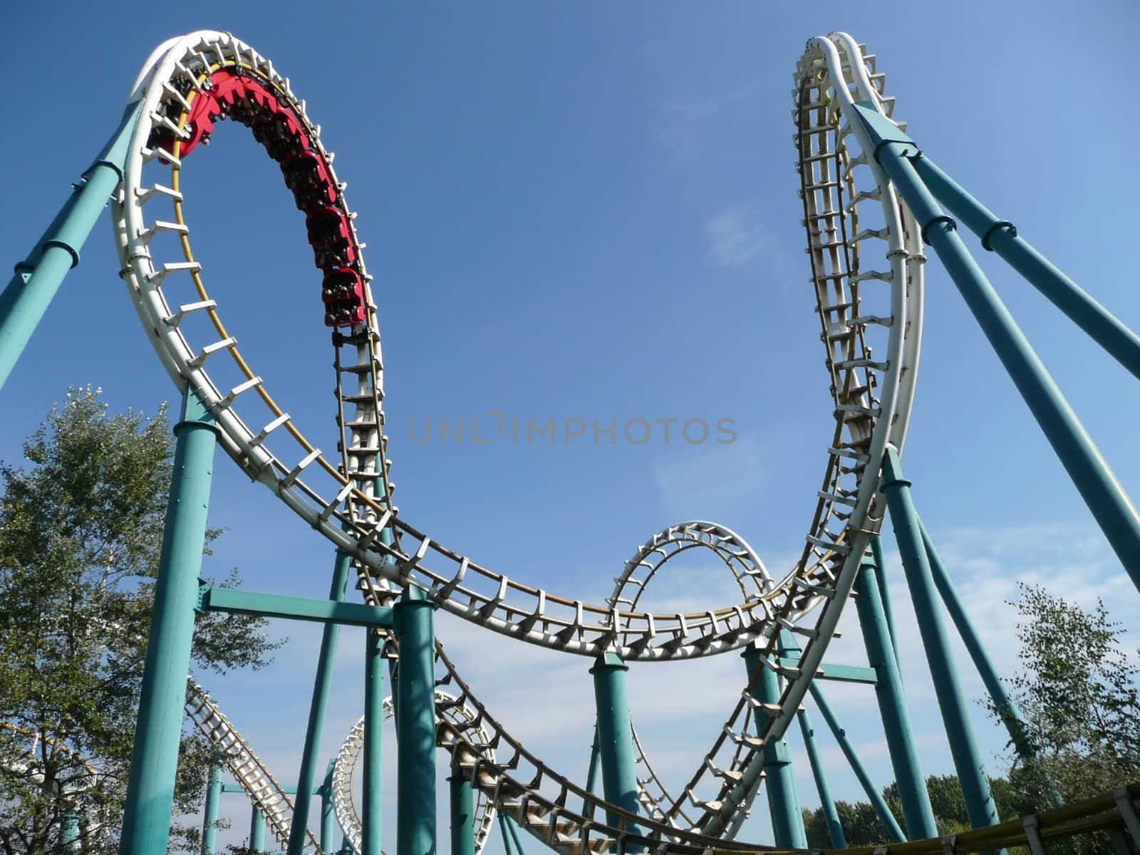 Rollercoaster in amusement park by daboost