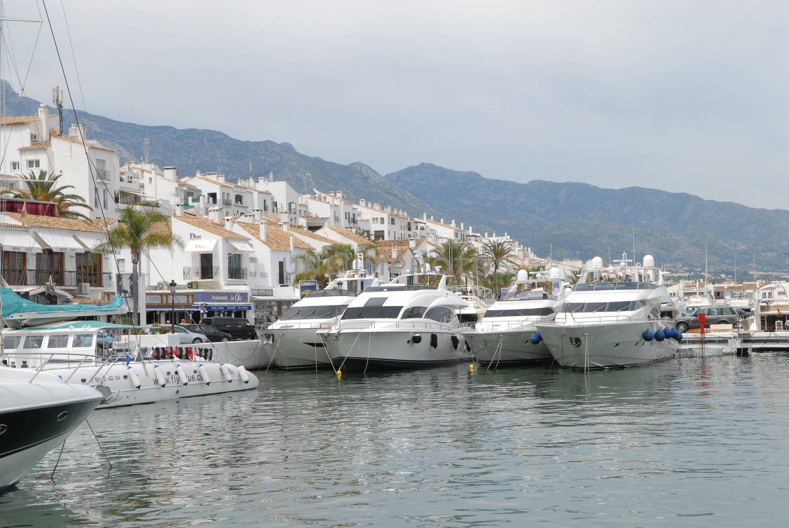 Scandinavian Lifestyle-vessels parking in the port by Bildehagen