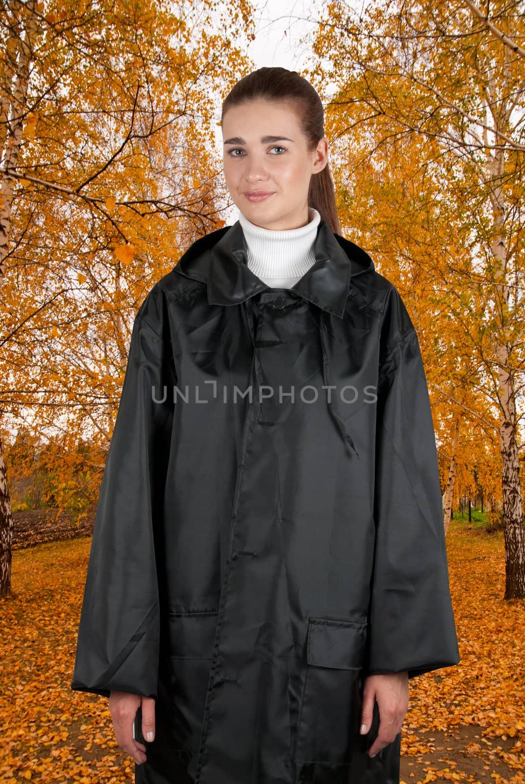 woman in rain coat by rusak