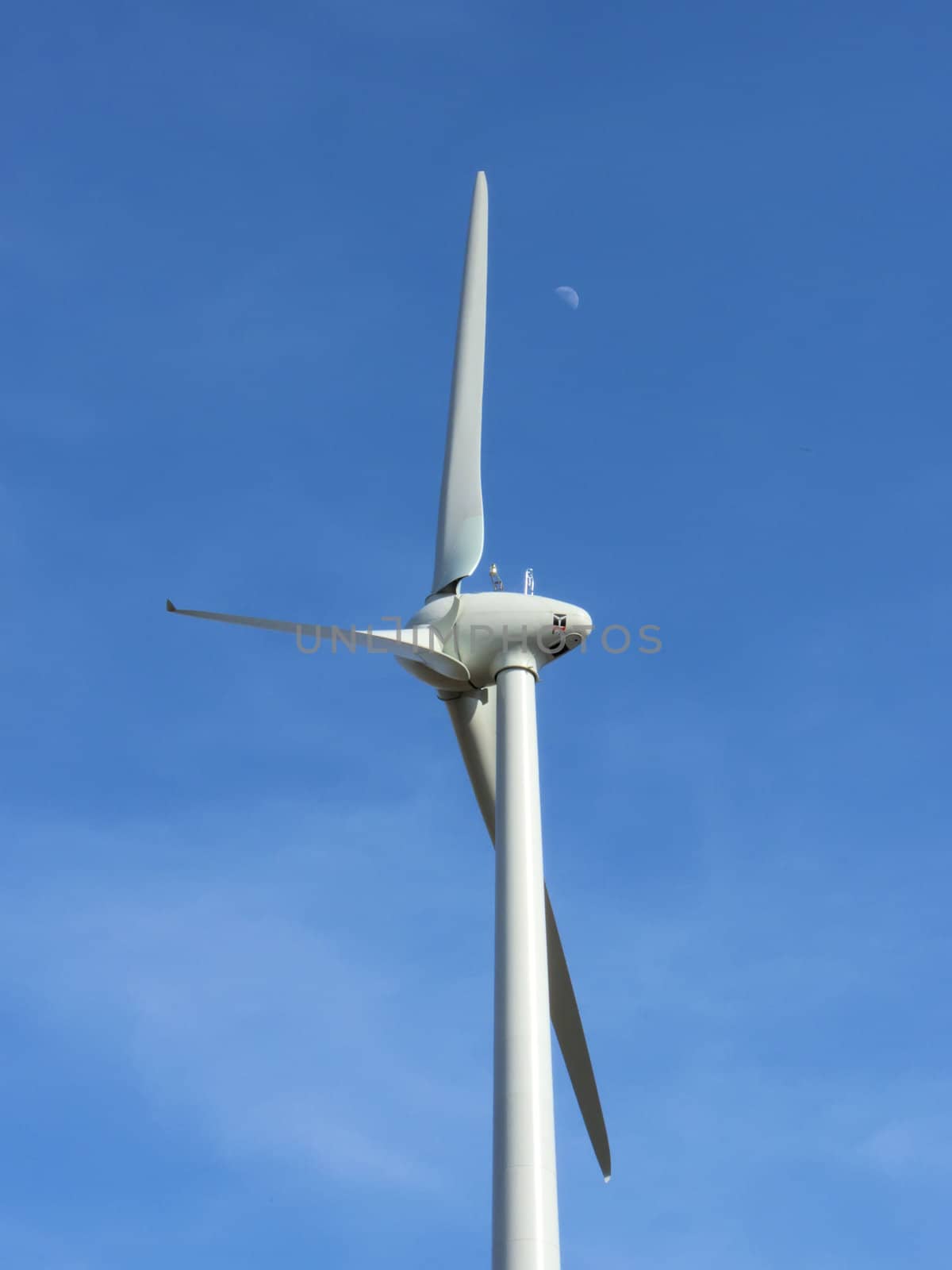 the  wind turbine on blue sky
