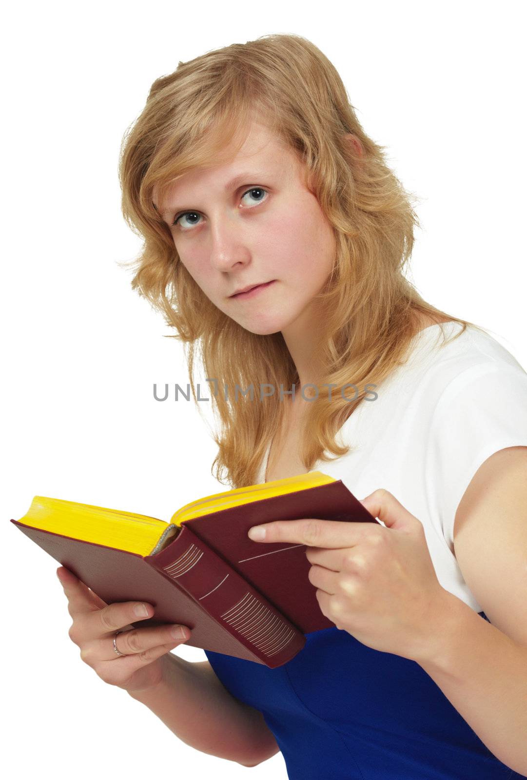 The girl - a student reading a textbook isolated on white background