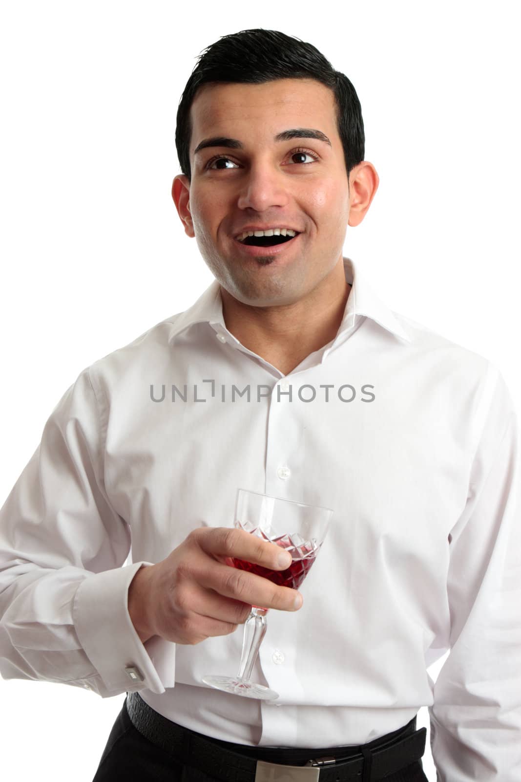 Happy professional  man looking up and holding a glass of wine.  Space for copy.  White backgound.
