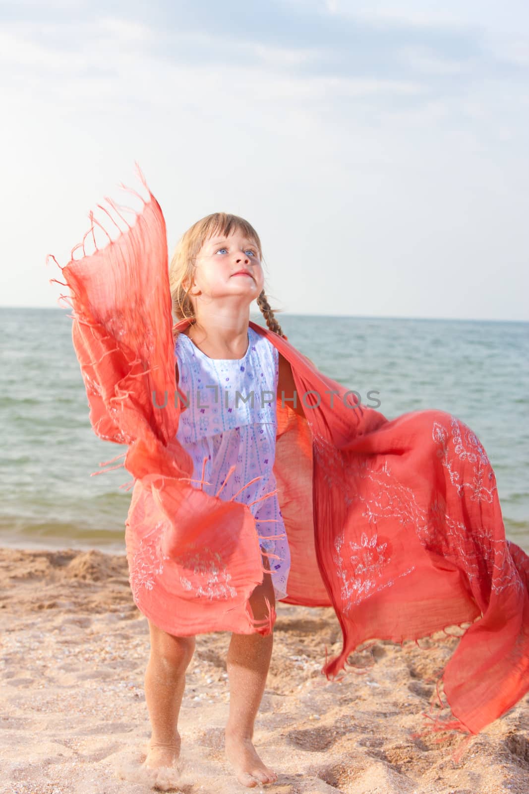 people series: little girl on sea beach are play the shawl game