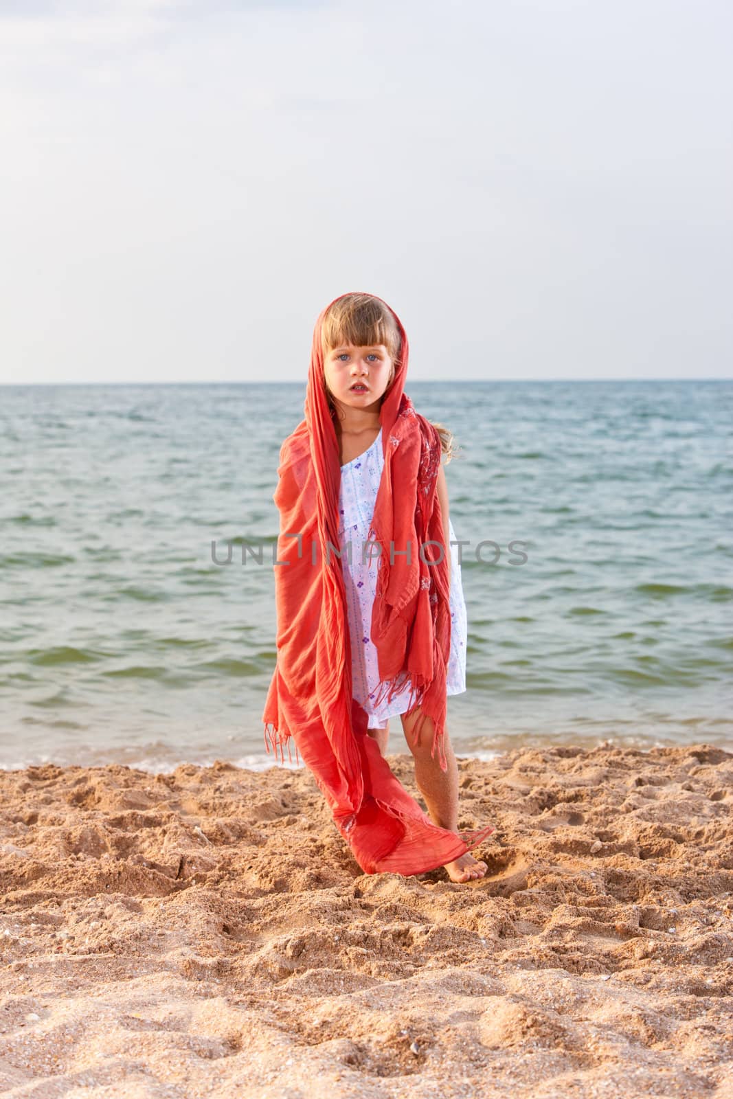 people series: little girl on sea beach are play the shawl game