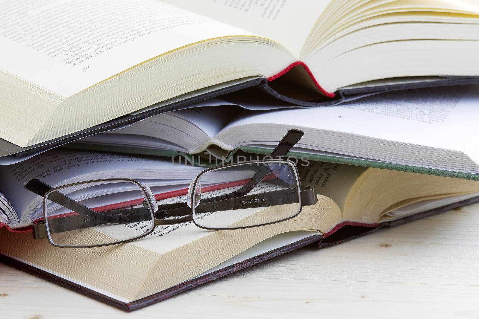 opened books and glasses