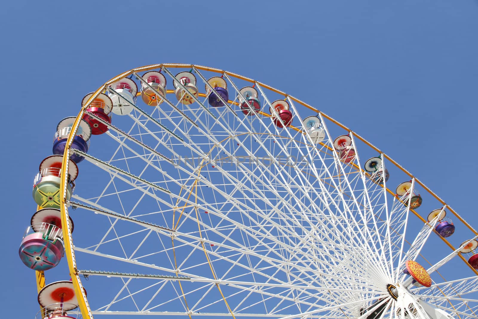 Ferris wheel in an amusement park by daboost