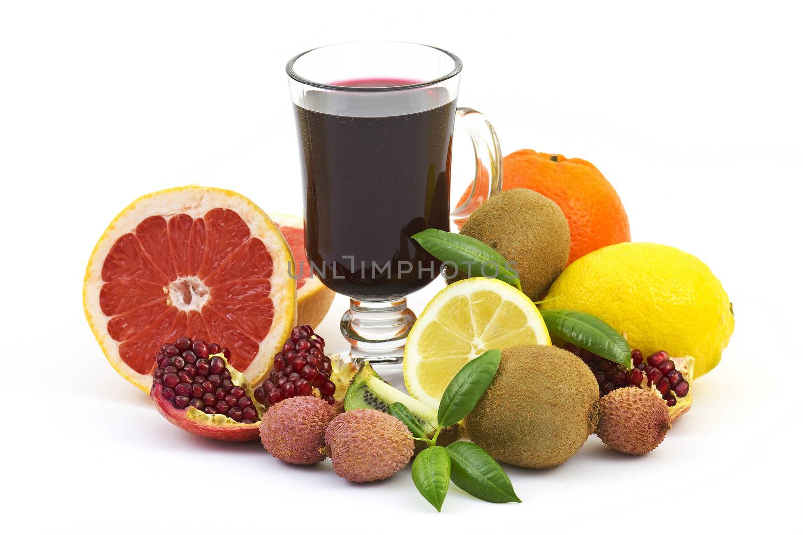 Collection of a ripe tropical fruits and pomegranate juice