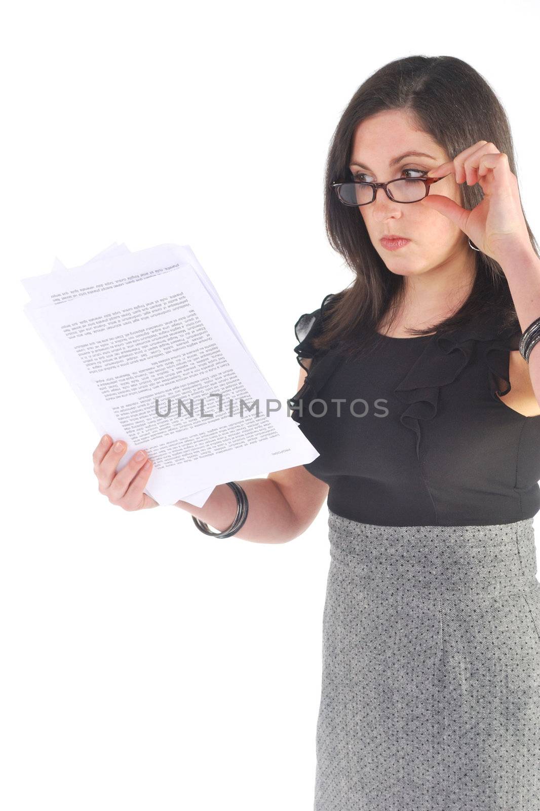 Business woman with glasses reading papers